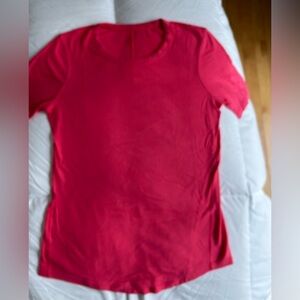 Lululemon Size 10 Glaze Pink hold tight s/s